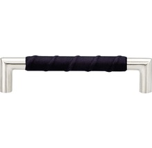 Skåpshandtag i metall lindad med textil