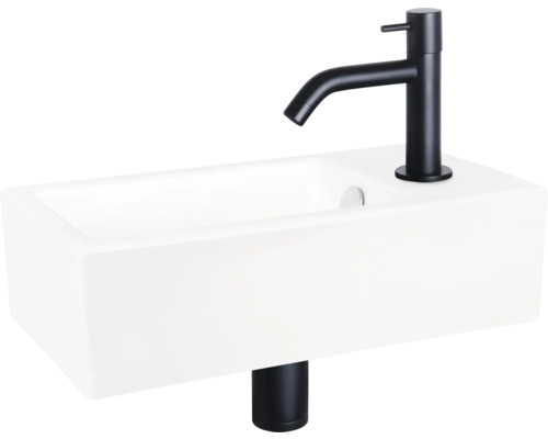 Tvättställ av sanitetskeramik med blandare