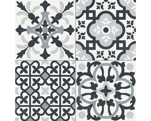 Dekorativ platta med geometriska och blommiga mönster