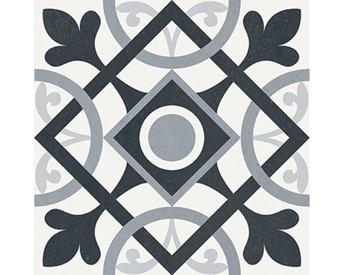 Dekorativ platta med geometriskt och blommigt mönster