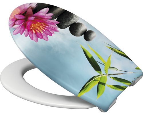 Toalettsits med motiv av blomma, stenar och bambu