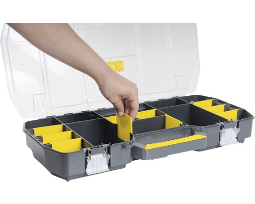 Öppen verktygslåda med justerbara fack och hand.