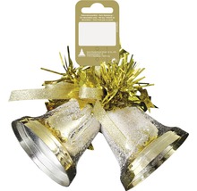 Gyllene julbjällror med rosett och glitter som dekoration