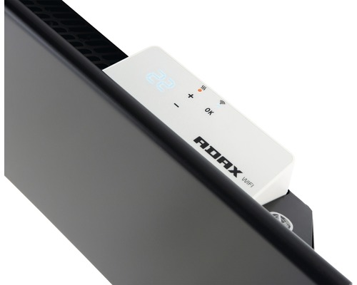 Detaljvy av en Adax radiator med digital termostat och WiFi funktion