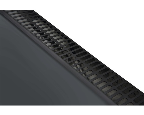 Detaljvy av en konvektionsradiator med ventilationsgaller