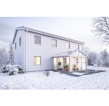 Hus med vinterträdgård på vintern
