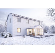 Vinterlandskap med hus och tillbyggnad