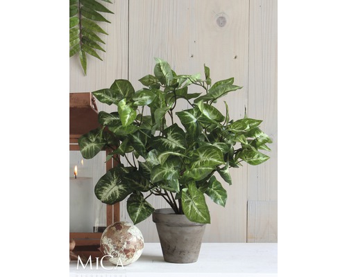 Konstgjord grön växt i kruka för dekoration