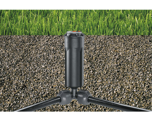 Pop-up sprinkler i trädgården