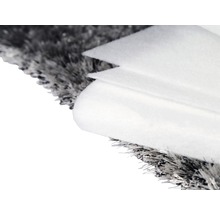 Detaljvy konstgräs med fleece remsor