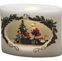 Dekorativt LED-ljus med jultomte, julgran, barn och presenter som festlig dekoration.