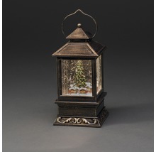 Dekorativ snöglobslykta med julmotiv