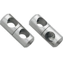 Två rörkopplingar av metall med hål