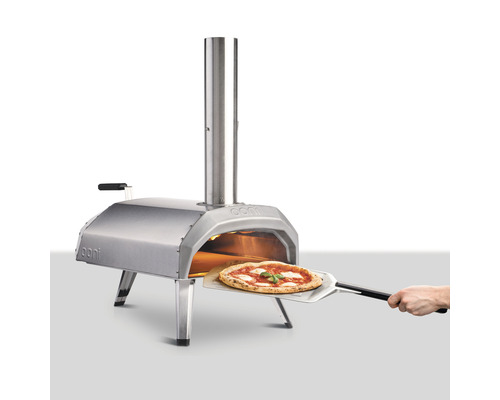 Ooni pizzaugn i rostfritt stål med pizza på pizzaspade