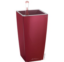 Röd blomkruka med vattennivåindikator