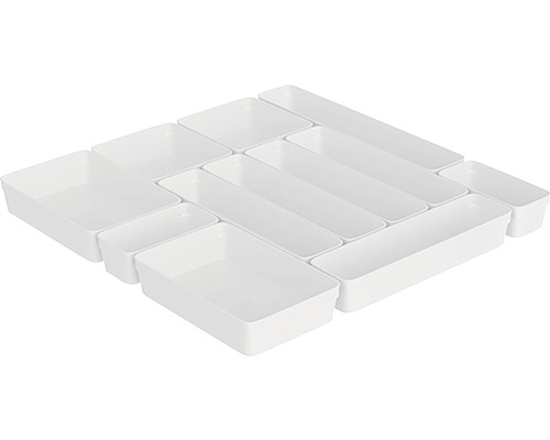 Set med flera lådinsatser för förvaring.