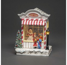 Juldekoration: godisaffär med jultomte och barn