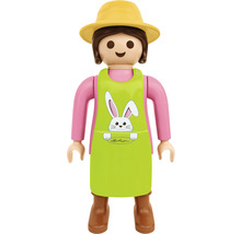 Leksaksfigur kvinna med hatt och förkläde