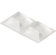Två plastskydd för skruvhål