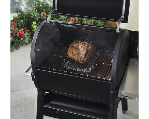 Grill med stek på gallret