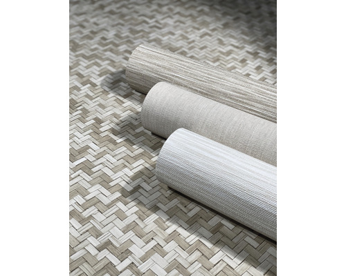 Tre rullar textil tapet på vävd bakgrund