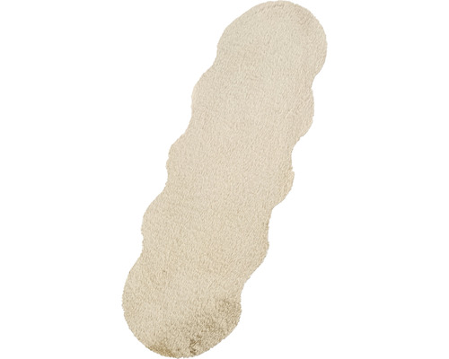 Beige matta med vågig kant