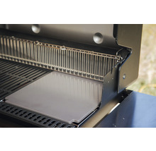 Öppen grill med grillgaller och pizzasten