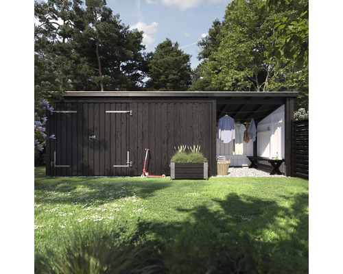 Trädgårdsscen med redskapsbod, tvättlina, bänk och planteringslåda