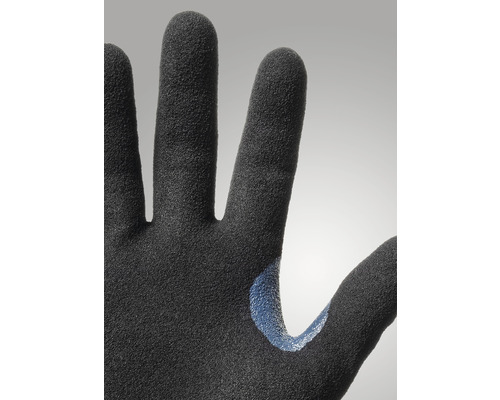 Detaljbild av en arbetshandske med texturerad yta