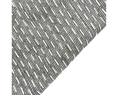 Matta med randigt mönster och reliefstruktur