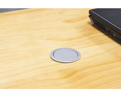 Bordsskiva med kabelgenomföring och laptop