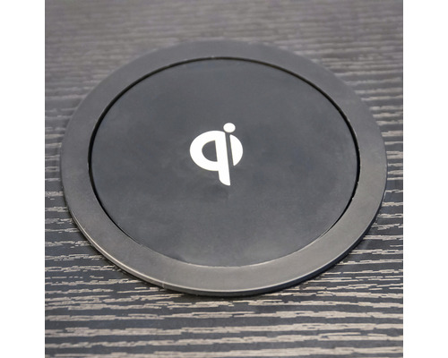 Rund, trådlös laddningsstation med Qi-logotyp