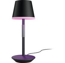 Bordslampa med svart lampskärm och violett fot