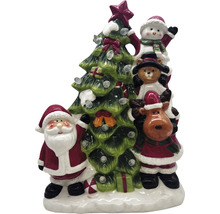 Juldekoration med jultomte, snögubbe, teddybjörn, ren och julgran