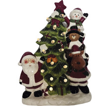 Dekorativ julfigur med jultomte, snögubbe, teddybjörn, ren och julgran med belysning.