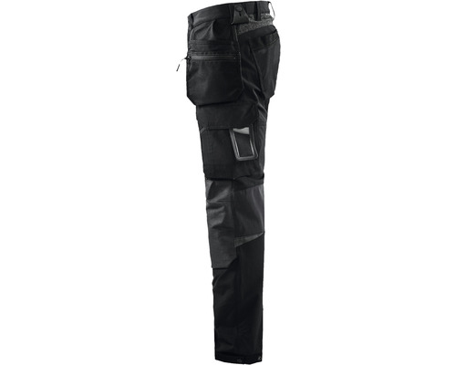 Svarta arbetsbyxor med flera fickor.