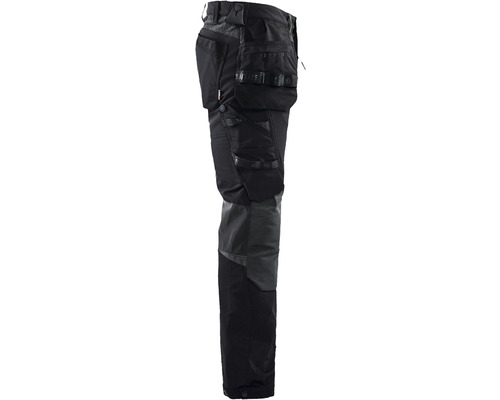 Svarta arbetsbyxor med flera fickor.