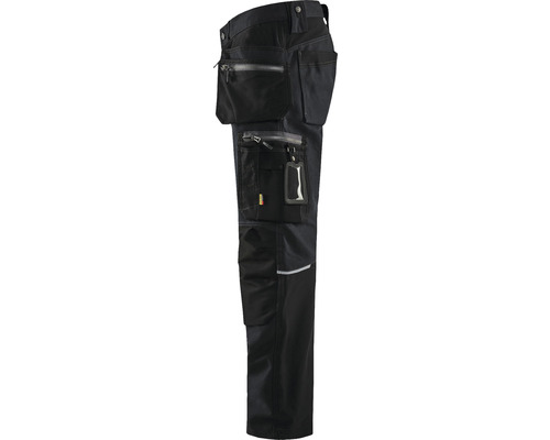 Svarta arbetsbyxor med flera fickor.