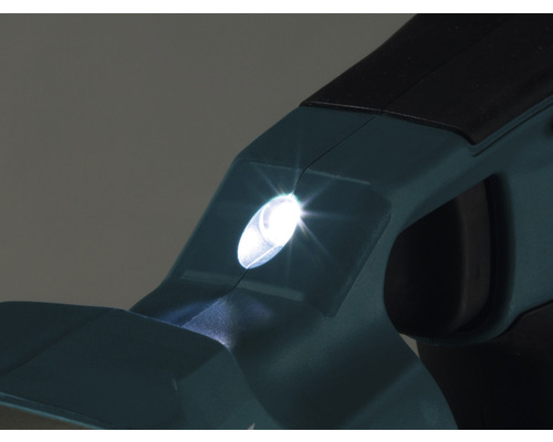 Detaljbild av en häcksax med LED-belysning tänd