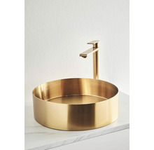 Runt tvättställ med metallblandare