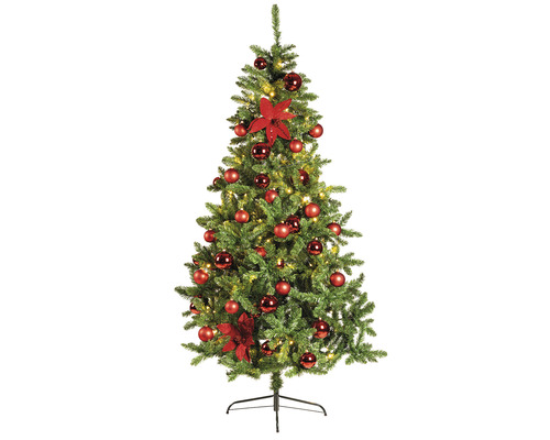 Dekorerad julgran med julgranskulor och blommor