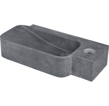 Grå betonggjutform med urtag och hål