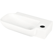 Vitt handfat i keramik med kranhål