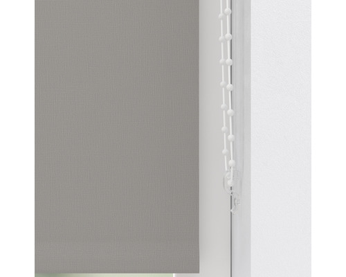 Grå tygrullgardin med manöverkedja