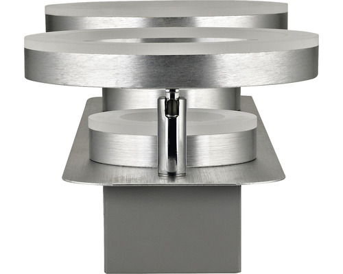 Vägglampa i metall med runda element