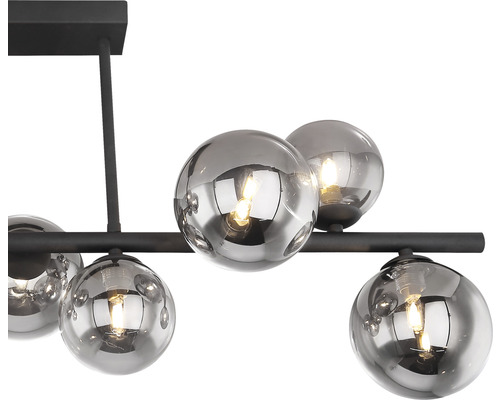 Modern pendellampa med fem sfäriska lampskärmar i glas