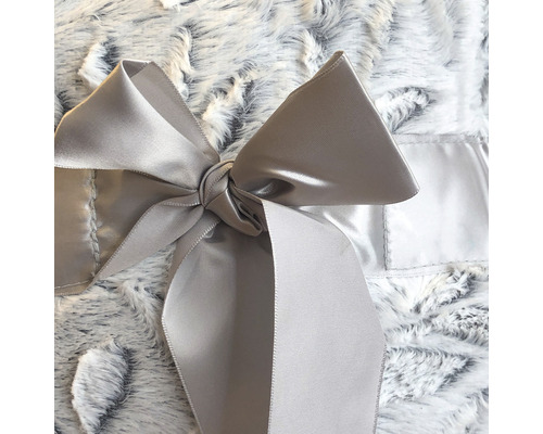 Dekorativ filt med rosett