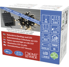 Förpackning för batteridriven LED-ljusslinga med varmvita lysdioder och svart kabel för utomhusbruk