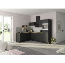 Modernt kök med svarta skåp, ljusa träbänkskivor och kakelvägg