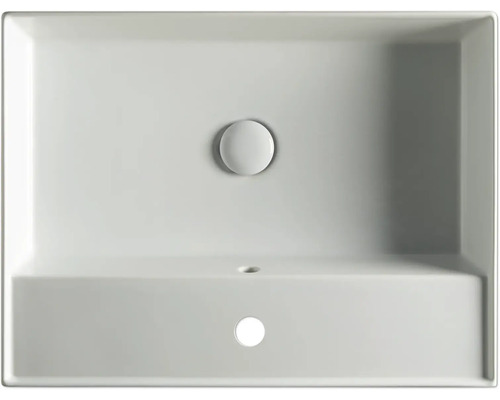 Övervy av en rektangulär tvättställ av keramik med avloppsarmatur